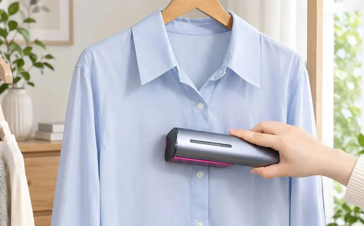 steaming clothes on a hanger